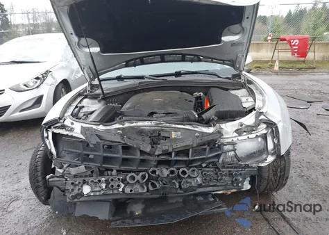 2013 Chevrolet Camaro 1Ls z USA, uszkodzony, nr VIN 2G1FE1E31D9213936